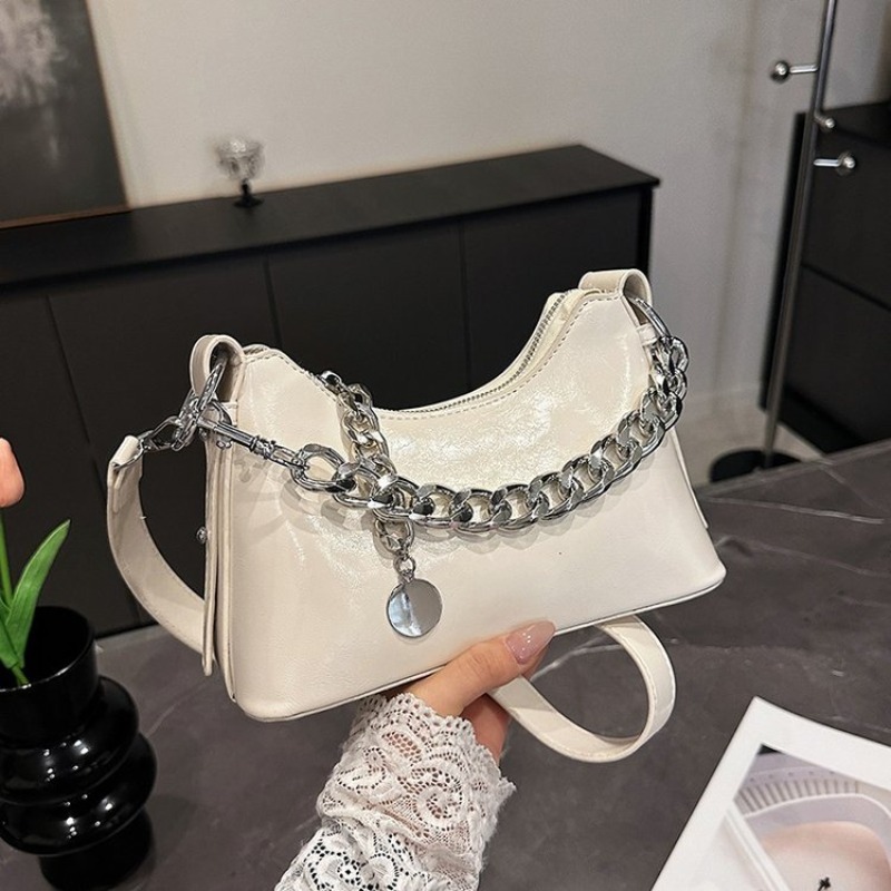 حقيبة حفاضات جلدية فاخرة للسيد - مراجعة Luxury Bags Paris وسعره